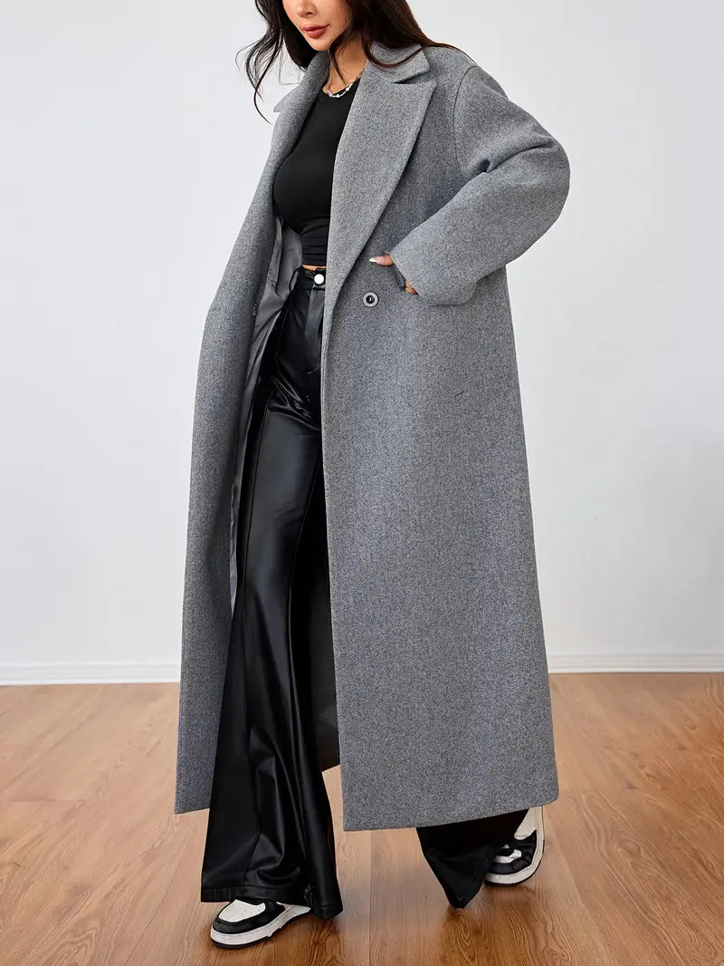 Grå lång tweedkappa