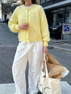 Stickad cardigan med rund hals